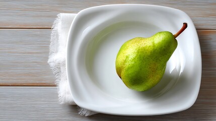 Green Pear Placed on a White Plate Over a Wooden Surface