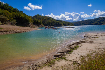 Lago Del Salto, in Lazio region (Italy),  reflects the sky and greenery