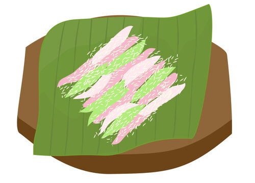 Cenil cake with sprinkle of coconut grated on banana leaves, a traditional colorful snack from Indonesia.