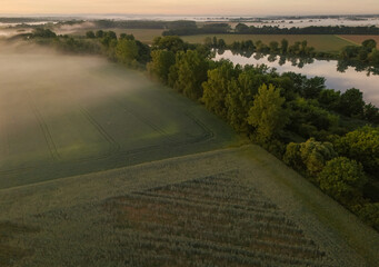 Aerial Drone view of Soane river in France in morning fog at sunrise