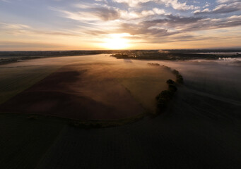 Aerial Drone view of Soane river in France in morning fog at sunrise
