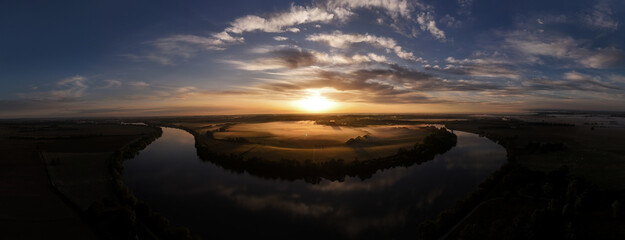 Aerial Drone view of Soane river in France in morning fog at sunrise