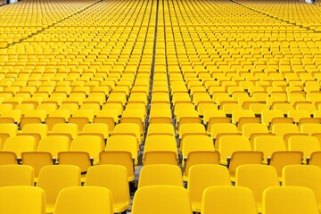 Fototapeta premium Endless rows of yellow stadium seats creating a striking pattern.
