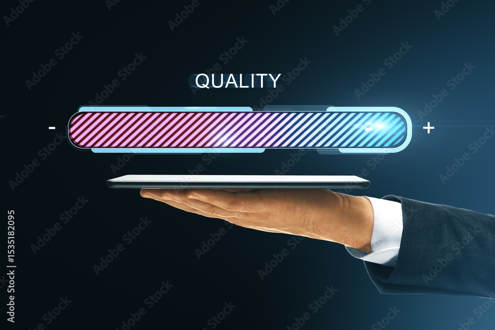 Aufkleber Businessman hand showing digital tablet with glowing progress bar labeled QUALITY on dark background in modern virtual interface concept.