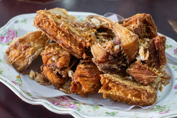 Crispy Fried Fish on Floral Plate