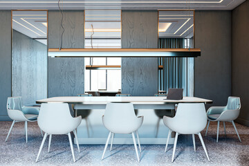 Modern empty conference room interior with sleek furniture and professional lighting in a bright...