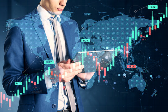 Businessman analyzing online forex trading data on tablet with global map and candlestick charts in background representing financial markets growth.