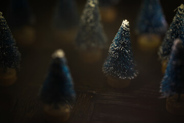 Miniature Snow-Covered Christmas Trees in Festive Decoration for Holiday Season