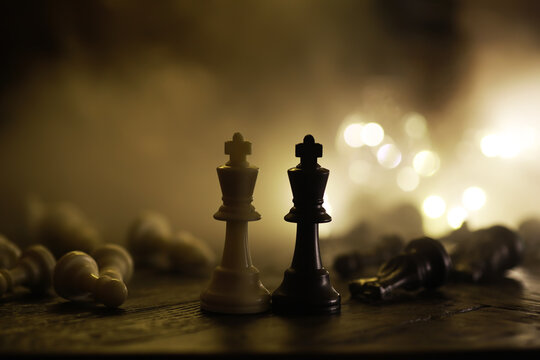 Strategic Chess Game with King Pieces and Dramatic Lighting