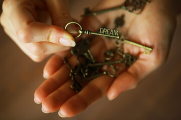 Hand Holding Antique Keys with 