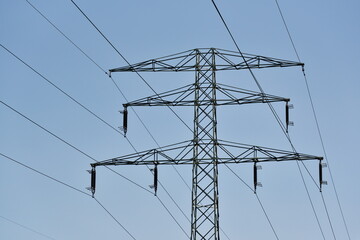 Hight voltage pole and blue sky, electric cebles in Wroclaw, Poland.