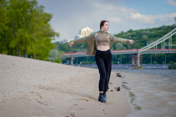 Close-up Fashion woman portrait of young pretty trendy girl posing at beach, stylish pretty...