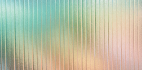 Obraz premium Abstract colorful striped background features a dynamic pattern of blurred lines, creating a vibrant and textured design with a gradient of blue and green hues.