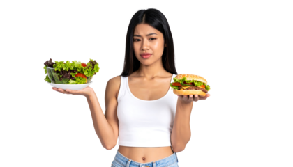 Young Woman Choosing Between Salad and Hamburger
