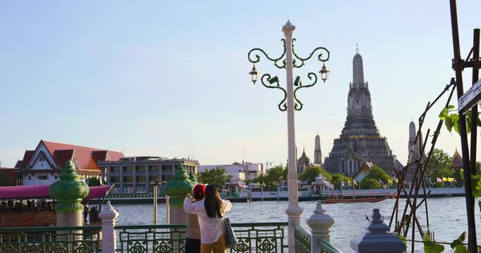 Wat arun temple of dawn riverside with sunset light sky cloud sightseeing travel in Bangkok Thailand