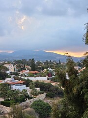 View on city and mountains in sunrise lights of morning. Cyprus June.
