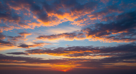 Obraz premium Natural blue sky with soft white clouds in daylight, featuring authentic cloud formations and clean atmosphere, ideal for backgrounds, weather visuals, or serene outdoor scenes