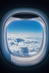 Airplane window view showcasing a breathtaking sky filled with fluffy white clouds and a vibrant blue horizon, capturing the essence of travel and adventure in the atmosphere