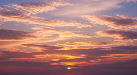 Fototapeta premium Natural blue sky with soft white clouds in daylight, featuring authentic cloud formations and clean atmosphere, ideal for backgrounds, weather visuals, or serene outdoor scenes