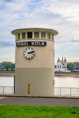 Bright day at Pegel Köln water level gauge tower in Cologne, Germany