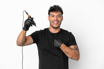 Tattoo artist caucasian man isolated on white background with surprise facial expression