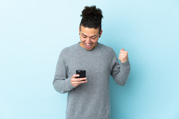 Caucasian man over isolated background surprised and sending a message