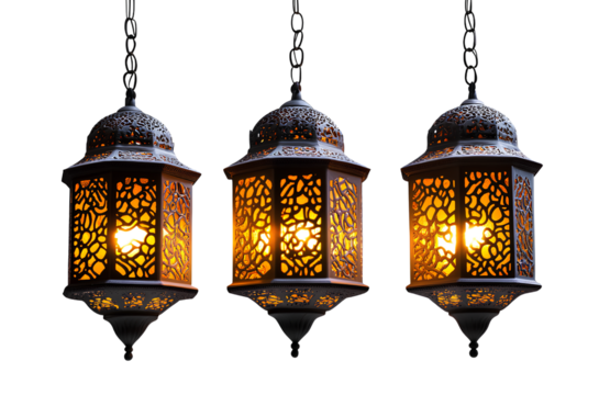  A set of three hanging lanterns with an Arabic design, each containing two glowing lights on the top and bottom
