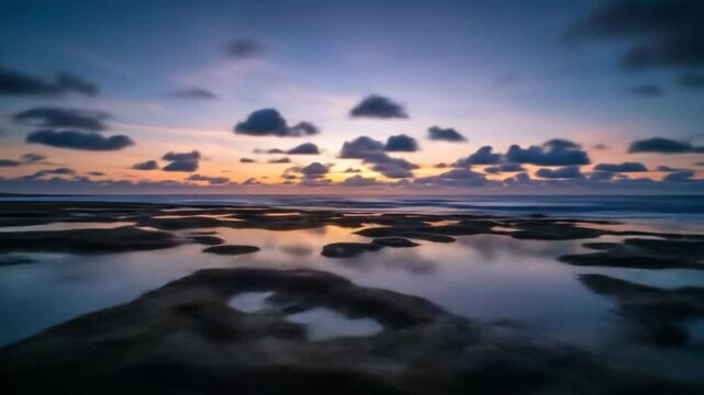 Sunset over a rocky tidal pool