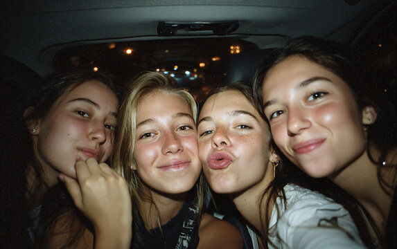 nighttime group selfie photo flash point and shoot camera friends dark