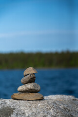 A Tranquil Waterscape Rock Balancing and Serene Ocean View