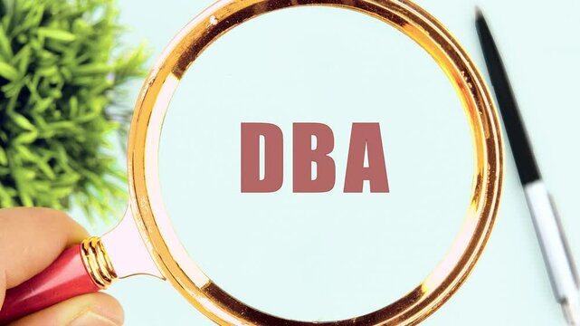 Animation of the appearance of the word DBA through a magnifying glass on a light background. Text DBA (Database administrator)