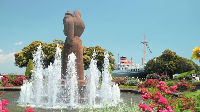
Yokohama, Japan - 05 June 2025 : Guardian of Water statue, fountain and flower gardens at Yamashita Park, first seaside park in Japan in front of Yokohama Port, between Osanbashi and Yamashita Pier - Powered by Adobe