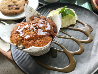 Gourmet Muffin with Cream and Caramel Drizzle