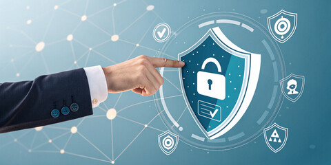 Businessman Hand Touches a Shield for Privacy Protection and Security