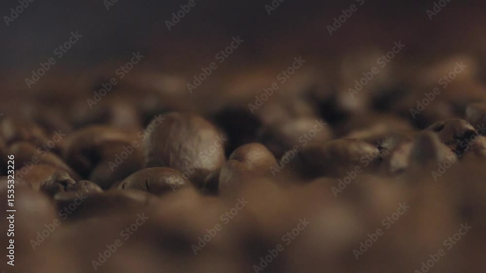 Aufkleber Roasted coffee beans piling up, focusing gradually between different detail levels, creating smooth visual transition across textured brown surface