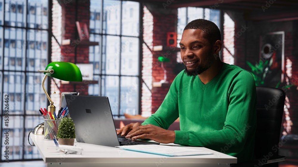 Poster man at home desk using laptop and checking emails displayed on screen, reading messages in inbox and