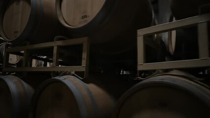 Wine Barrels Stacked in Cellar