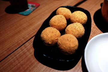 Indulge in these savory Korean-style cheese balls, perfectly golden and dusted with seasoning. A...