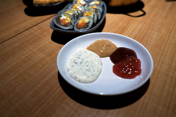 a delicious trio of sauces and mayo, ideal for complementing modern Korean dishes and various...