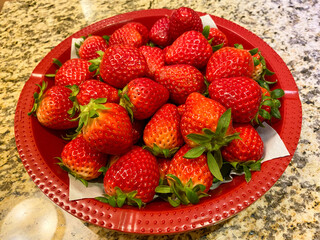 Fresh Strawberries on Red Plate