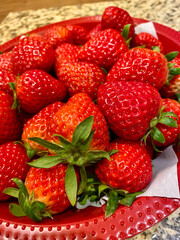 Fresh Strawberries in Red Bowl