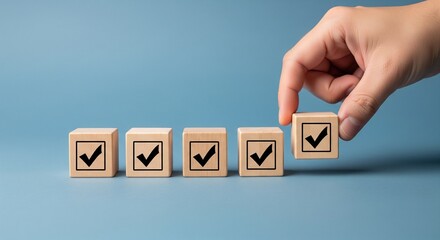 Checklist and task progress tracking concept. A hand placing the final checkmark on wooden blocks in a progress bar, task completion, productivity, goal setting, and efficient project management. 
