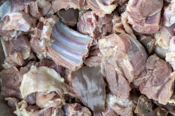 Raw mutton portions washed and ready to cook. Fresh meat culinary background.