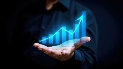 Businessman Hand Holding Blue Growth Chart image