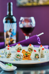 sushi platter with fresh fish, shrimp, eel, rice, and wasabi