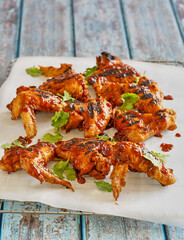 grilled chicken wings tossed in a sticky BBQ glaze