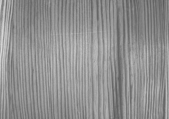 Vertical lines in a wood grain pattern create a natural, textured appearance in grayscale. The design features alternating light and dark stripes for a striking visual effect