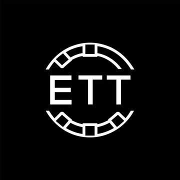 ETT Modern Tech Logo, Design &ndash; ETT Later Logo,  Futuristic Blue and White Circular Emblem on Black Background.
