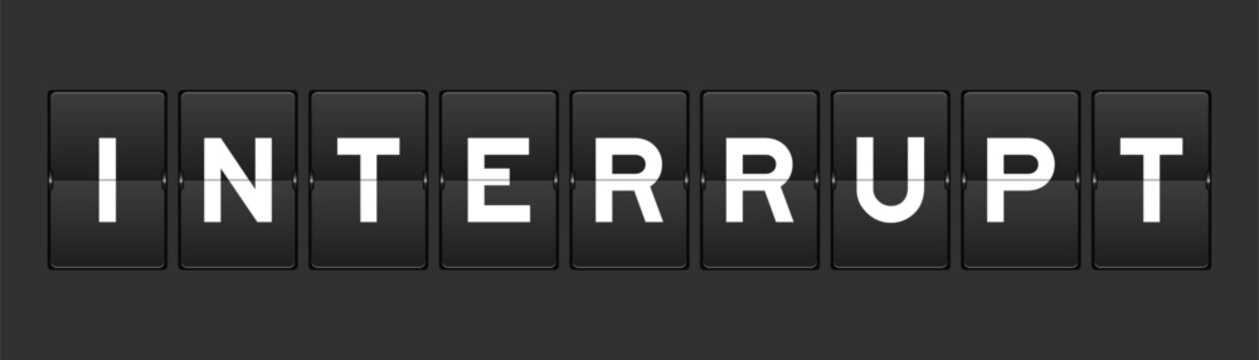 Black color analog flip board with word interrupt on gray background
