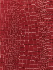 A Close-Up of Luxurious Red Crocodile Leather Texture Showcasing Intricate Patterns and Rich Color Depth Ideal for Fashion and Design Applications